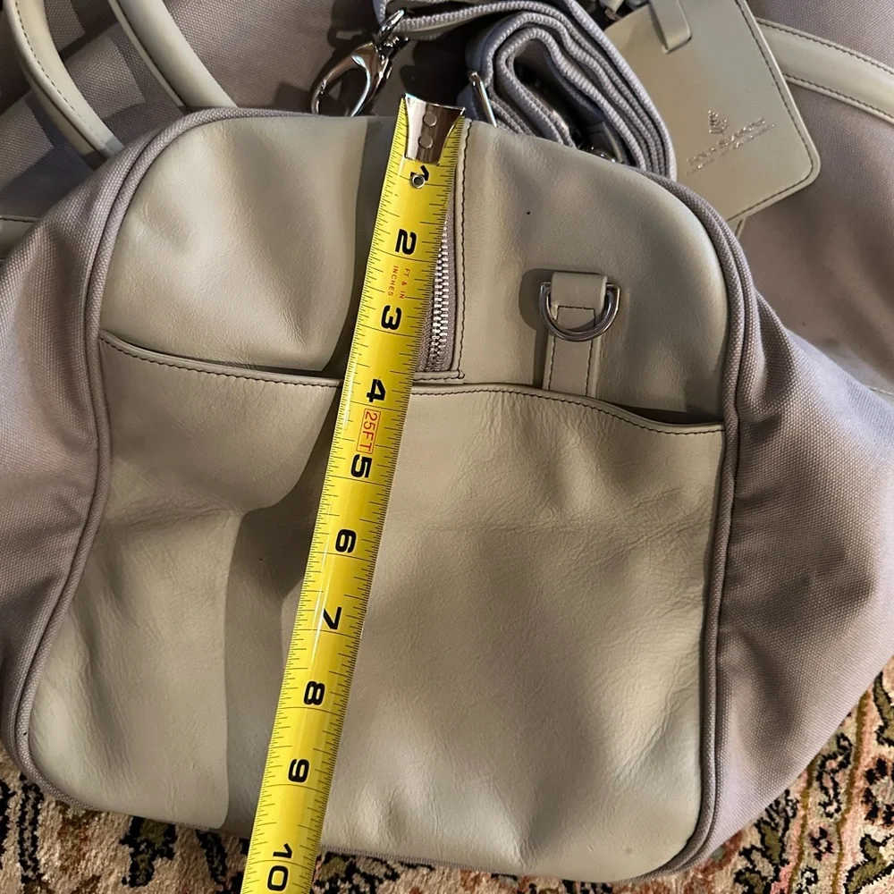 Exclusive Four seasons private jet experience duffel and toiletry kit.  BNWT
